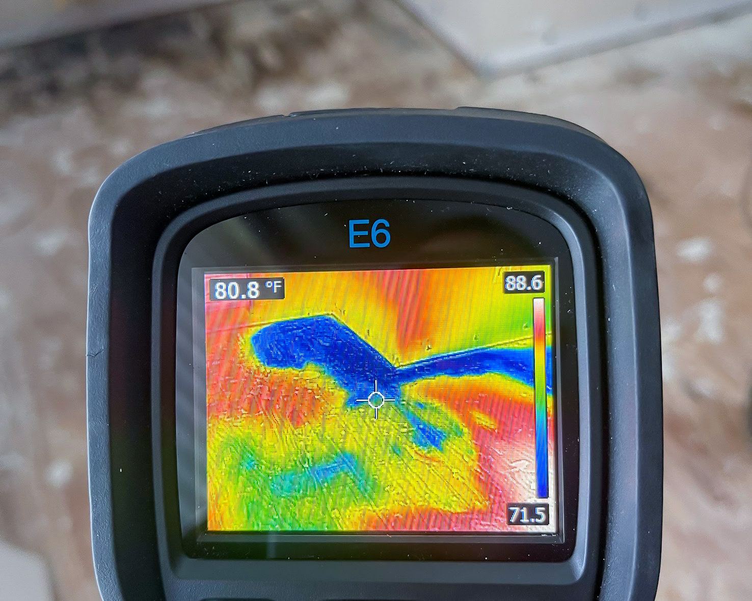 FLIR E6 thermal camera showing moisture in subfloor